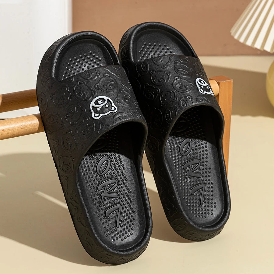 Pantuflas de verano para hombre con diseño de oso de dibujos animados, suela gruesa y suave, antideslizantes.